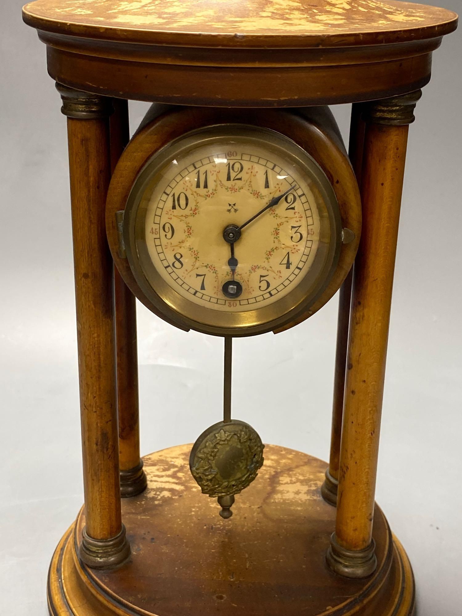 An early 20th century mahogany portico timepiece, height 32cm